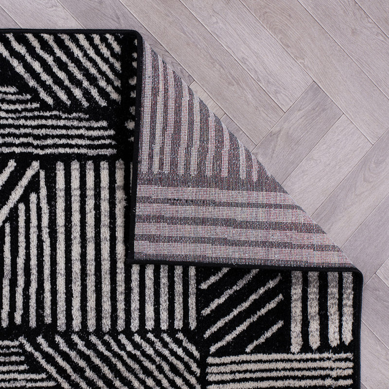 Rambo - Geometric Black & Ivory Polypropylene Indoor Area Rug