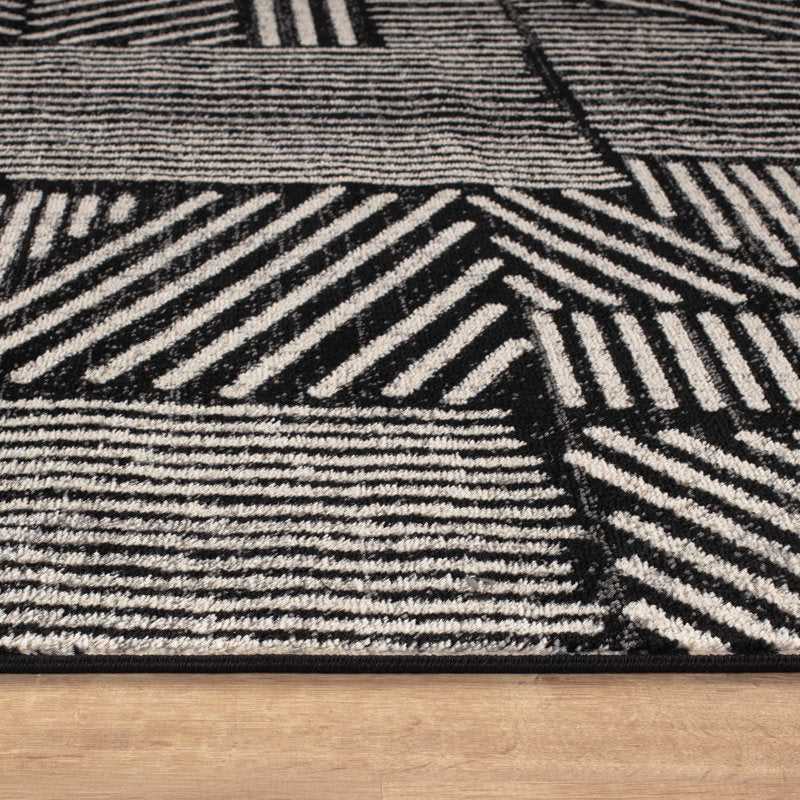 Rambo - Geometric Black & Ivory Polypropylene Indoor Area Rug