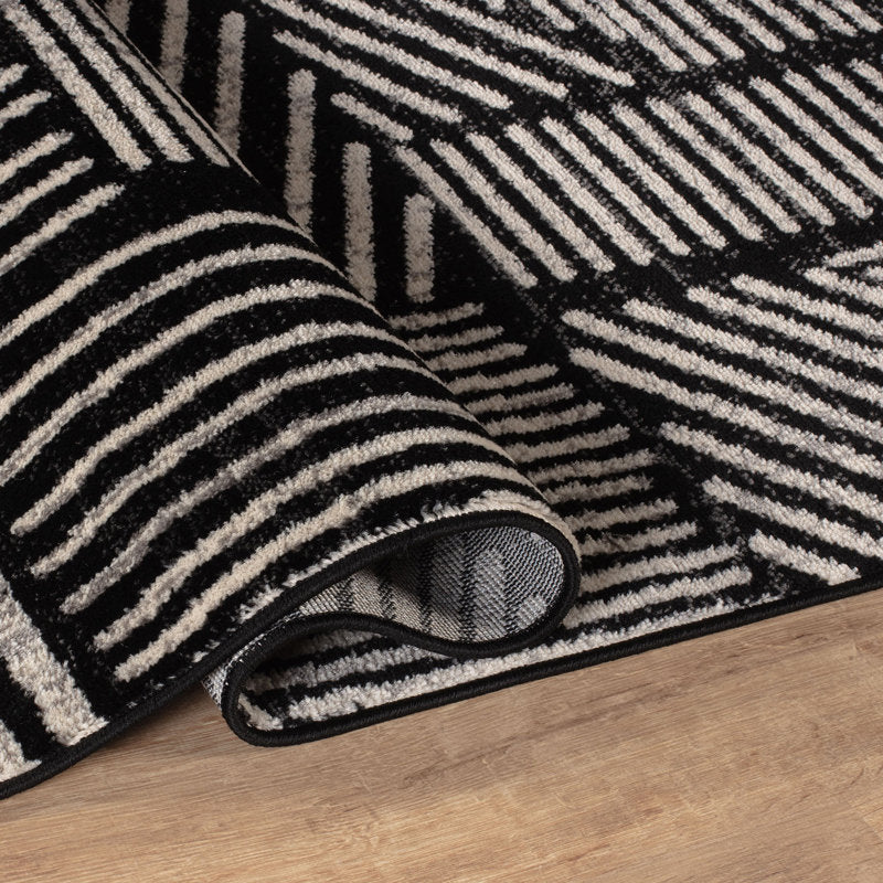 Rambo - Geometric Black & Ivory Polypropylene Indoor Area Rug